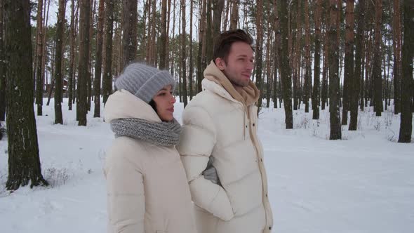 Girl and Boy Walking in Winter