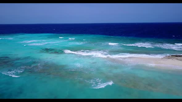 Aerial view abstract of tranquil coastline beach vacation by transparent ocean with white sand backg
