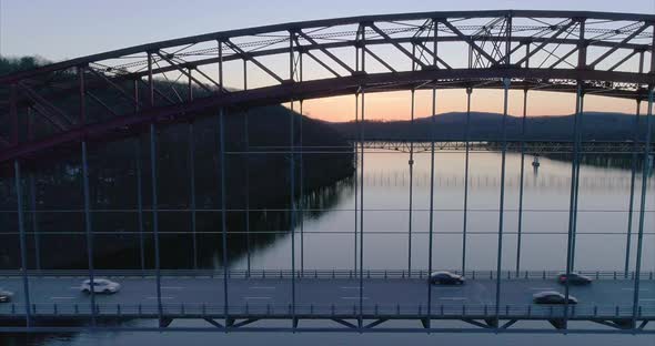 Top View Tilt Down of Cars Driving on the Amvets Bridge