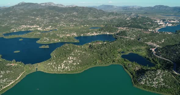 Aerial view of the Neretva delta valley river.