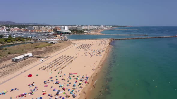 Aerial Video Beautiful Portuguese Beaches Near the Tourist Town Vilamoura Falesia with a View of the