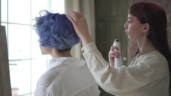 Young Woman Amateur Hairdresser Spraying Her Friend Coloured Bright Hair Spbd