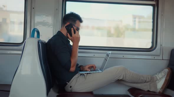 Mobile Worker Typing On Laptop In Train. Freelancer Internet Online Meeting Webinar.