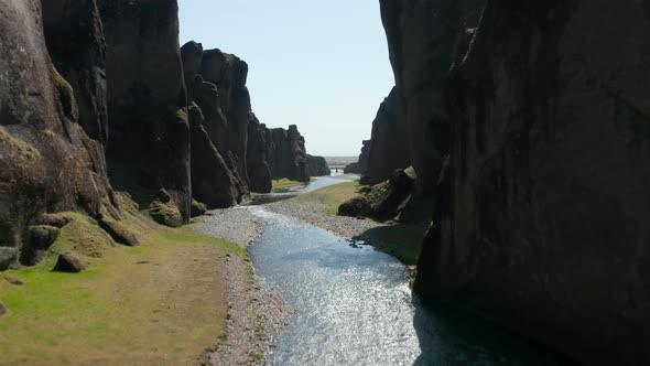 Aerial View of Fjadra River Flowing in Fjadrargljufur Deep Canyon in South Iceland