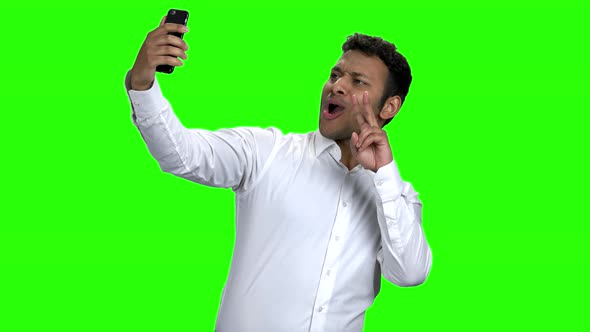 Young Businessman Taking Selfie with Mobile Phone