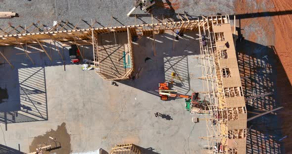 A Timber Frame House of Residential Building with a Without Under Construction Framing an Top View