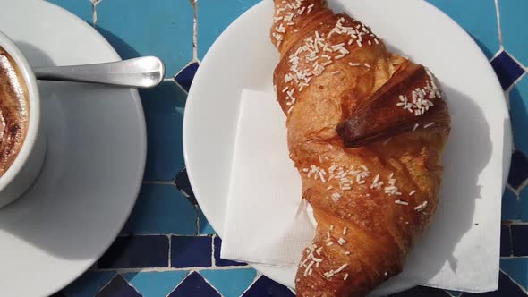 Coffee and Croissant Aerial View