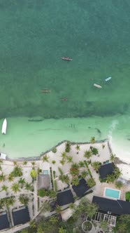 Vertical Video Boats in the Ocean Near the Coast of Zanzibar Tanzania