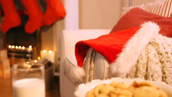 Christmas cookies on plate with a glass of milk