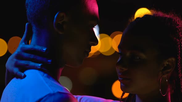Upset Black Teen Couple Tenderly Touching Foreheads at Night City, Farewell