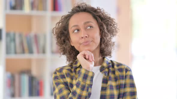 Portrait of Pensive Mixed Race Woman Thinking 