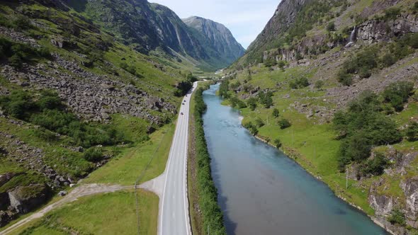 Lush mountain valley between Klagegg and Byrkjelo with road E39 passing through - River stardalselva