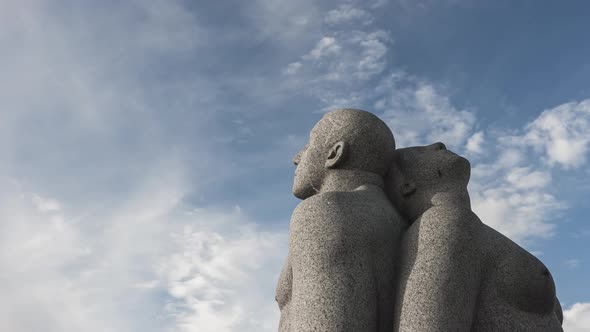 Gustav Vigeland Sculpture Of A Nude Man And Woman Sitting Back to Back At Vigeland Park In Frogner P