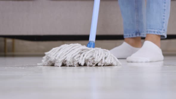 Housewife Washing Floor with Mop Everyday Home Cleaning Close Up Slow Motion