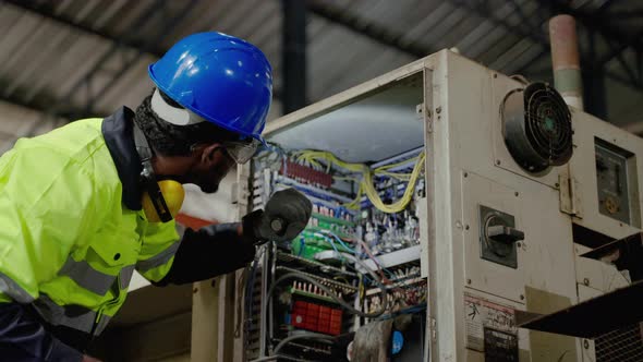 African American technician workers working in heavy industry , innovative industry standard