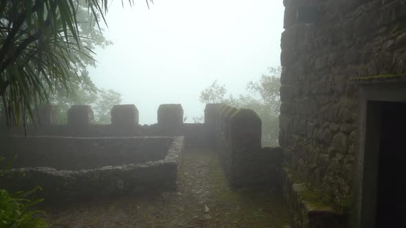 Defensive Guard Tower Wall of Moors Castle with Very Thick Fog and Mist