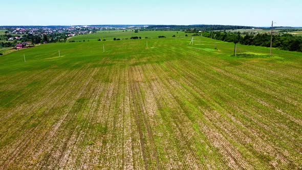 Aerial drone view of a flying over the rural agricultural landscape.