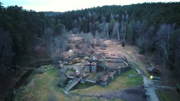 Park in Forest With Wooden Statues of Gnomes, Monsters.  Aerial View of the Wooden Castle 4K Video