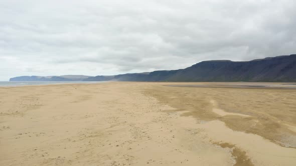 Raudisandur. Panoramic Drone View Of A Golden Sandy Beach In Iceland. aerial