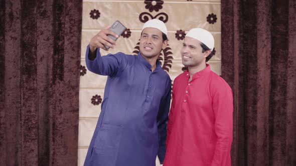 Muslim men clicking pictures