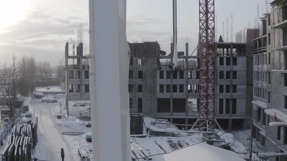 A Drone View of the Construction of a Residential Building Using a Concrete Pump