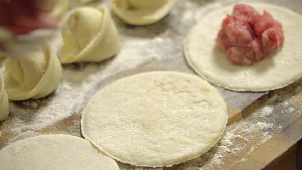 Meat Ball on a Piece of Dough, Cooking Dumplings