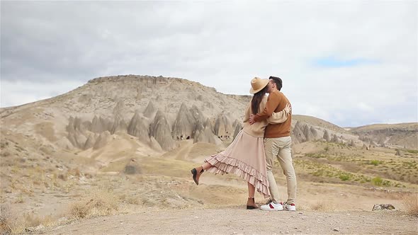 Happy Couple on Summer Vacation in Famous Place