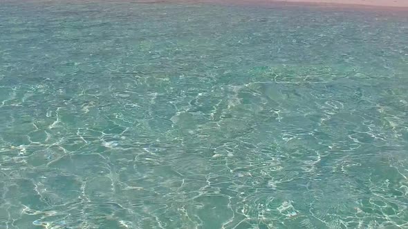 Sunny sky of marine coastline beach journey by sea with sand background near reef