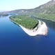Green island on the river. Panorama of green majestic island in wide river. - VideoHive Item for Sale