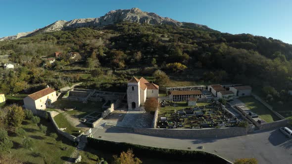 Aerial view of Saint Lucia Church and cemetery