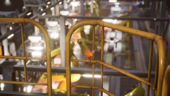 Interior of Car Factory with a Production Line alt