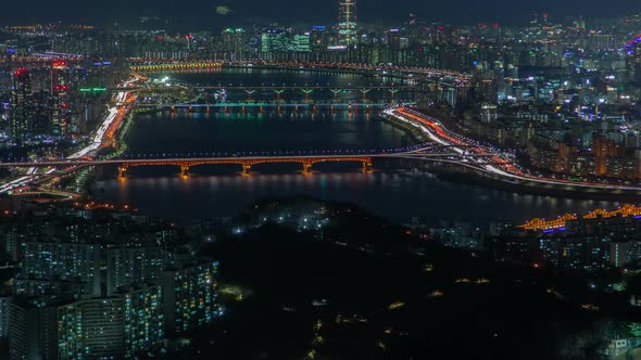 Timelapse Seoul with Illuminated Bridges Over Large River