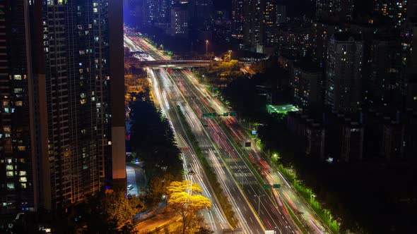 Shenzhen Urban Cityscape Aerial Road Traffic Panorama Timelapse at Night Pan Up