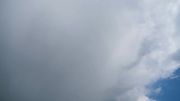 Clouds Move Smoothly in the Blue Sky. Timelapse