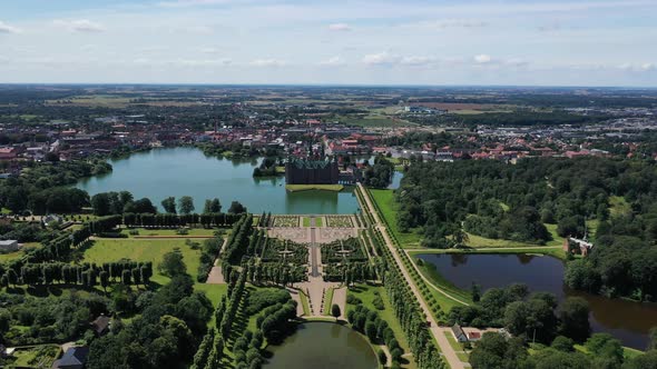 Wide-Angle View of Frederiksborg Castle and Its Gardens in Hillerod Denmark - Forward Panning Drone