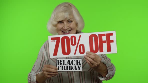 Grandmother Showing Black Friday and Up To 70 Percent Off Shopping Price Discount Advertisement