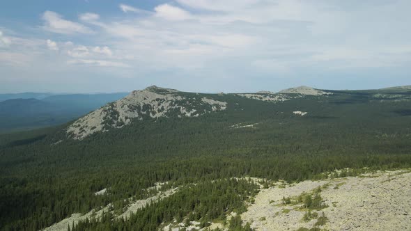 Beautiful mountain of stones among the forest