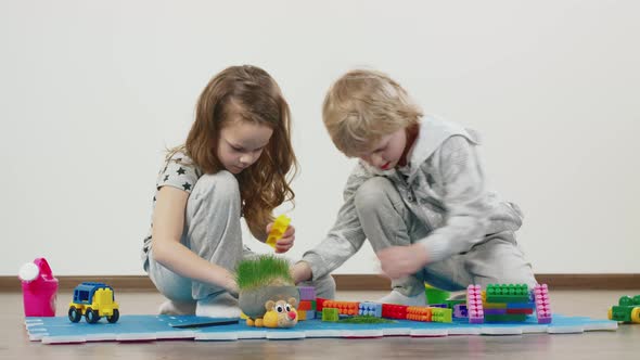 Young Brother And Sister Play Together