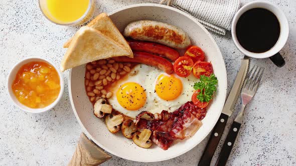 Traditional Full English Breakfast on Frying Pan.