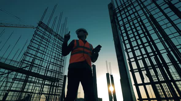 Construction Industry, Construction Project, Building Process During Sunset. Sunset Building Site