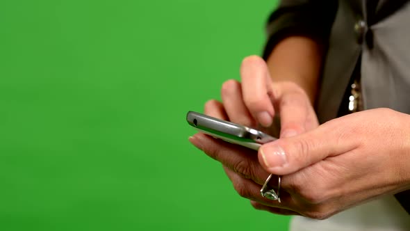 Business Woman Works on Phone - Green Screen - Studio - Closeup