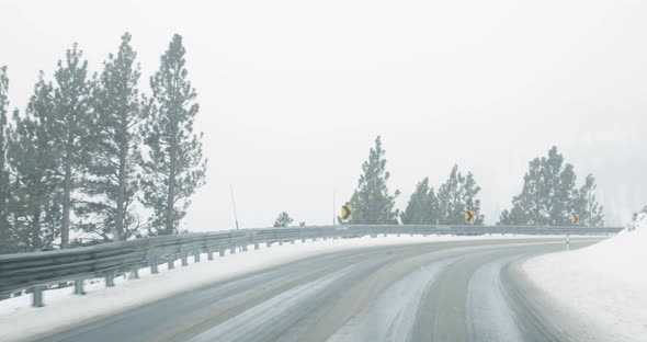 Drivin on mountain road in winter