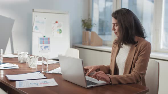 Modern Manager Working On Laptop