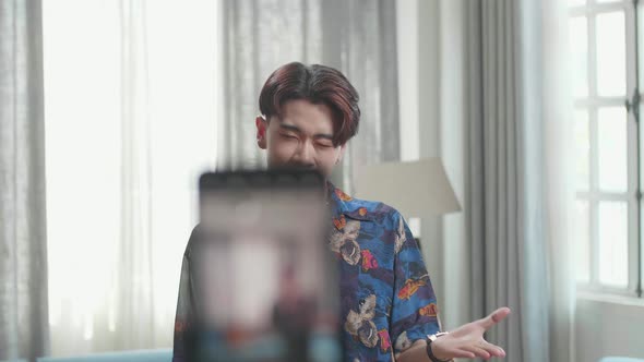 Asian Transgender Male Dancing While Shooting Video Content For Social Networks With A Smartphone