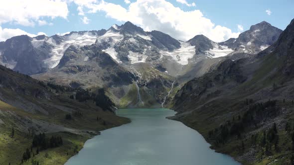 Aerial Icy Peaks and Mountains Altai Lake