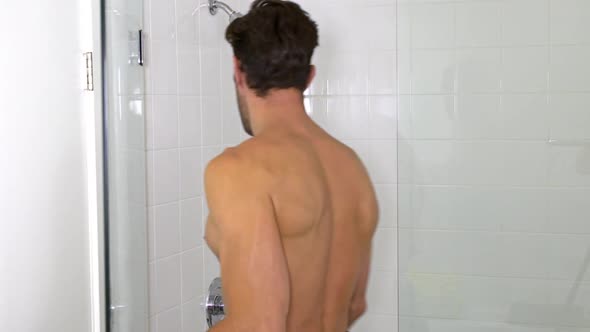 Athletic Man Showering