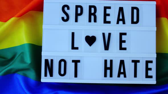 Rainbow Flag with Lightbox and Text SPREAD LOVE NOT HATE