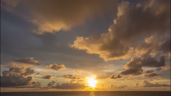 Time Lapse Red Sky In Sunrise Above The Sea.