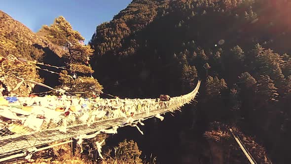 Largest Suspension Bridge in Khumbu Valley with Colorful Tibetan Prayer Flags