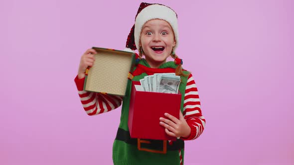 Cheerful Girl Christmas Santa Claus Elf Getting Present Gift Box Expressing Amazement Happiness